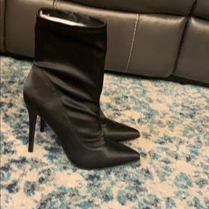 This is a black never worn size 12 bootie heel